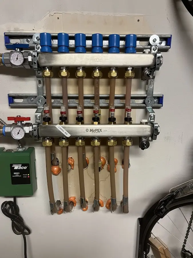 Plumber performing Water Heater Repair at a residential property in Gunbarrel